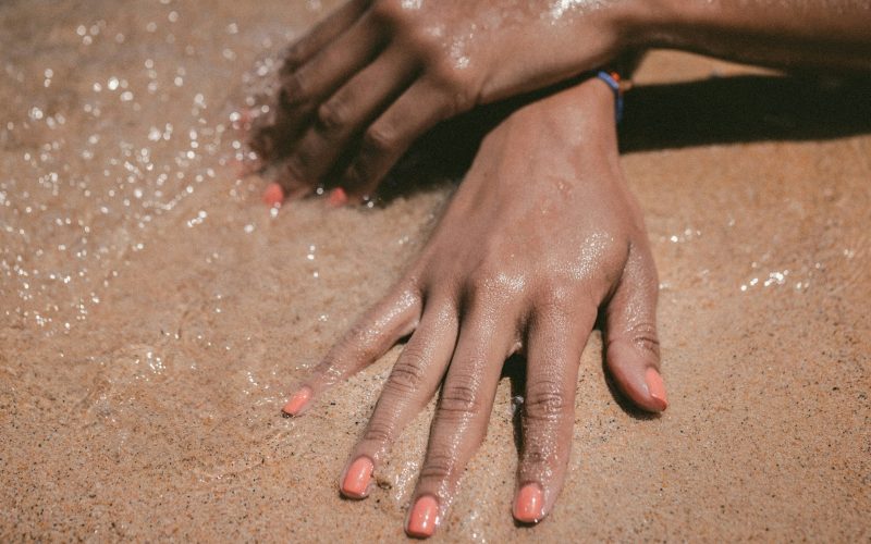 person hand showing nail polish