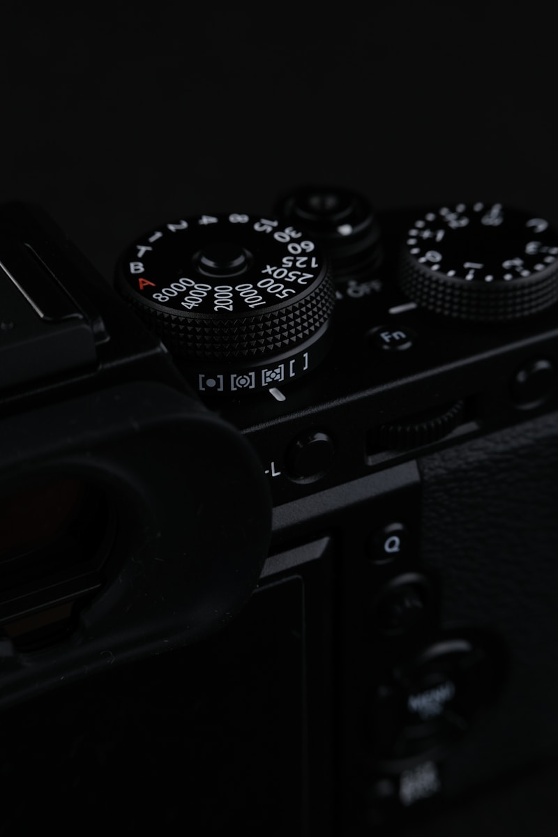 black and silver dslr camera